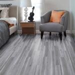 TrafficMasterAlberta Spruce 4 MIL x 6 in. W x 36 in. L Grip Strip Water Resistant Luxury Vinyl Plank Flooring (24 sqft/case) (821958)