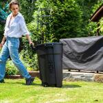 HDX 32 Gal. Black Outdoor Trash Can with Vented Design, Wheels, Domed Lid, Rounded Handles, and Reinforced Foothold (999-2432W)