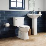 Kohler Elmbrook 12-Inch Rough-In Two-Piece Elongated Chair Height Toilet with Single Flush (1.28 GPF) in White, featuring a Soft Close Seat.